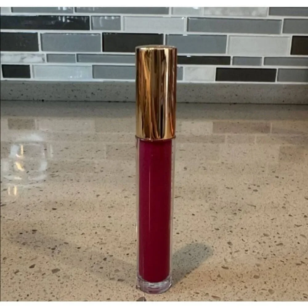Josie Maran voluptuous argan argon natural volume Pink shade Lip Gloss